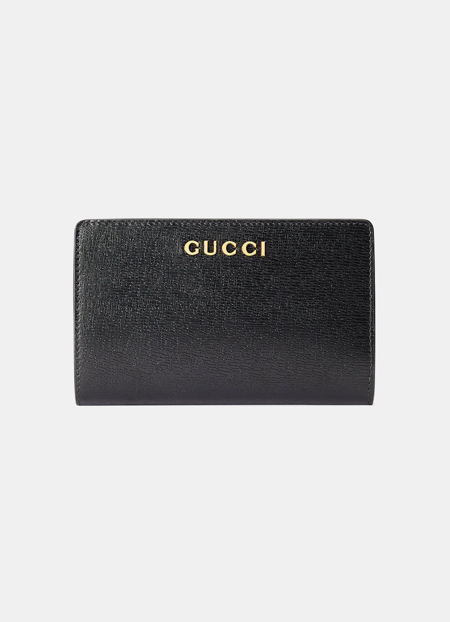 Cartera con cremallera y logo Gucci