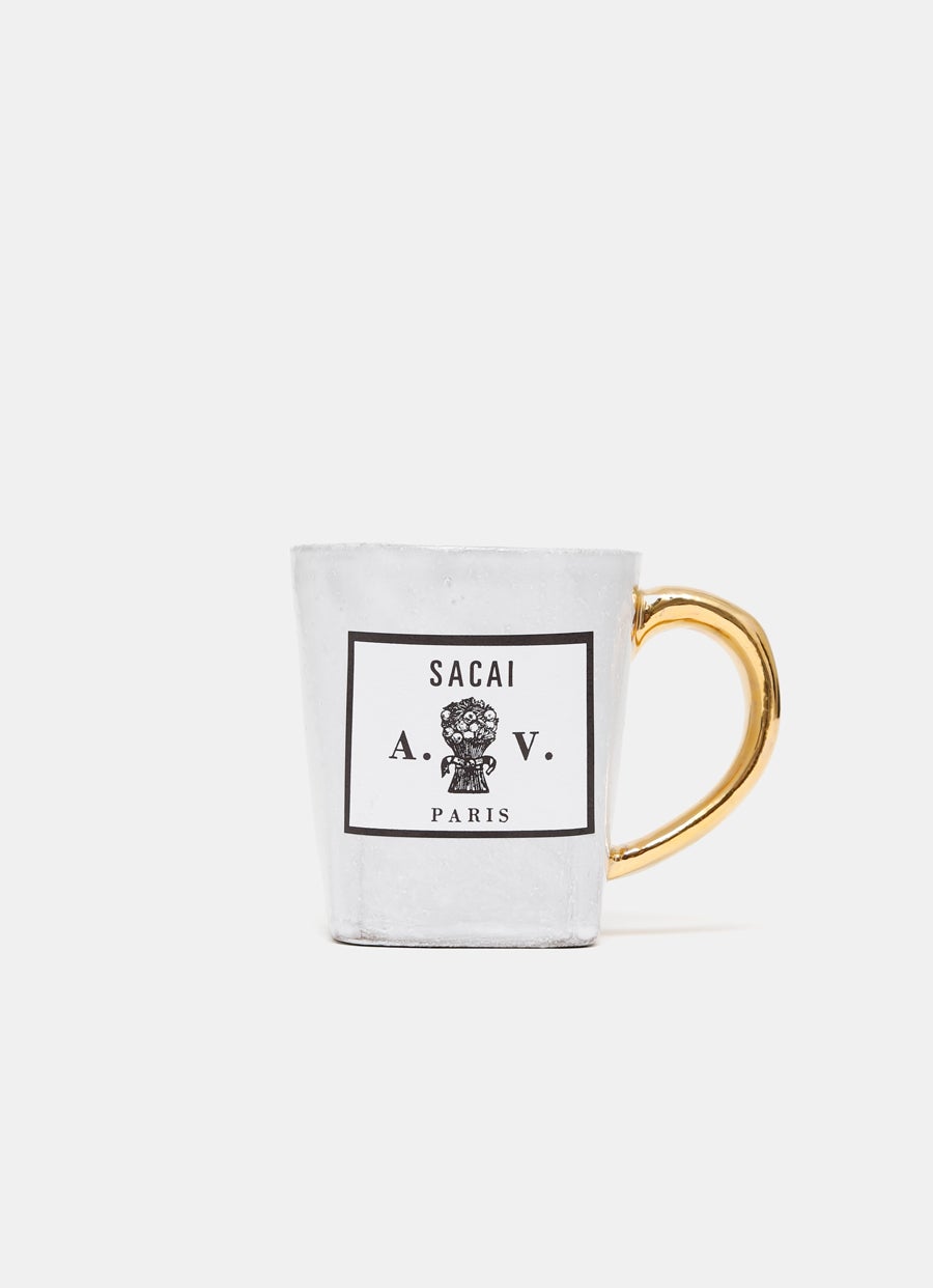 Vela perfumada Sacai en taza cerámica